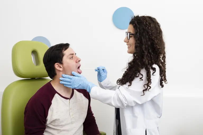 side-view-doctor-examining-patient-throat-768×512.jpg